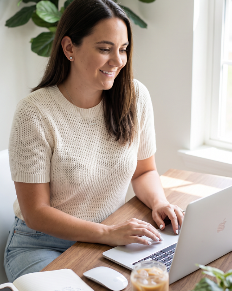 Therapist working calmly at a warm wooden desk