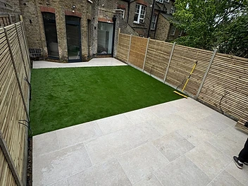 The Urban Retreat — Patio · Artificial Grass · Slatted Fence by Rubin Constructions Ltd