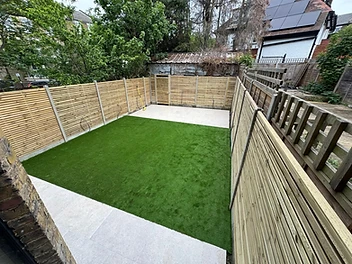 The Green Rectangle — Artificial Grass · Paving · Slatted Fence by Rubin Constructions Ltd