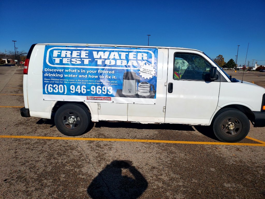 Free Water Test van banner on white cargo van