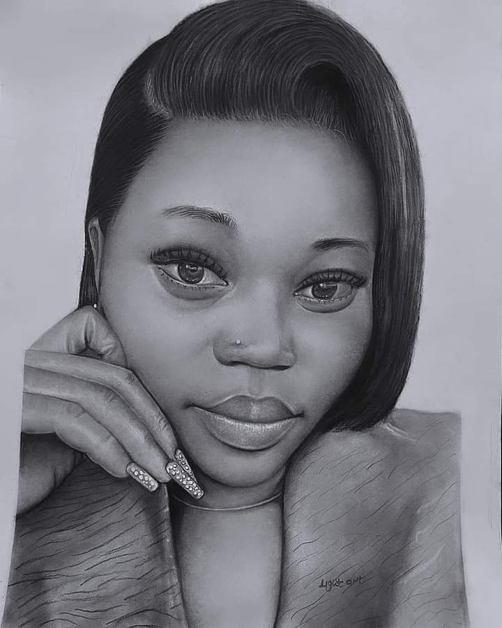 A beautifully posed portrait capturing elegance and softness through delicate graphite work.