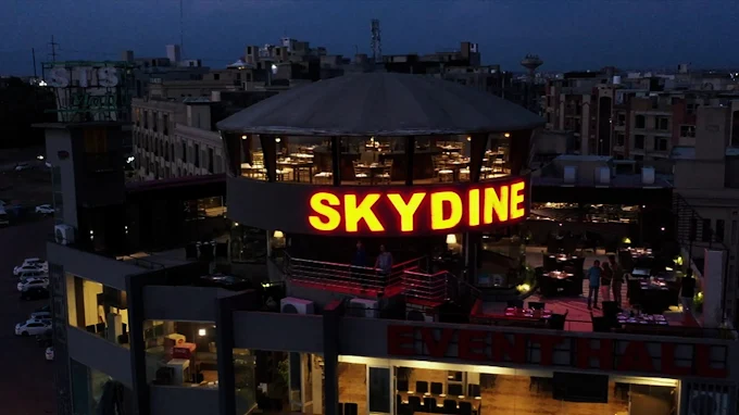 Skydine revolving restaurant exterior at night