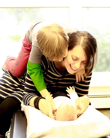 Dr. Alex with a child