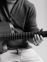Close-up of Tim's hands on the guitar