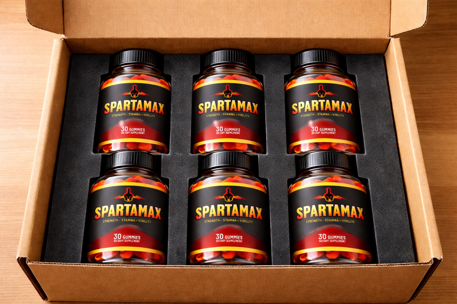 Open box holding six SPARTAMAX gummy bottles in a foam insert