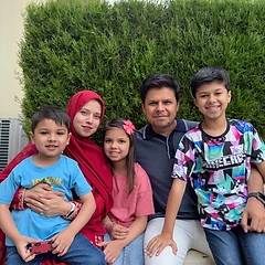 Five of us, one bench, endless chatter — family photo of the year.
