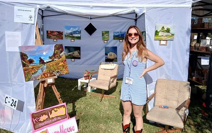 Kaitlin Whittle in her art booth