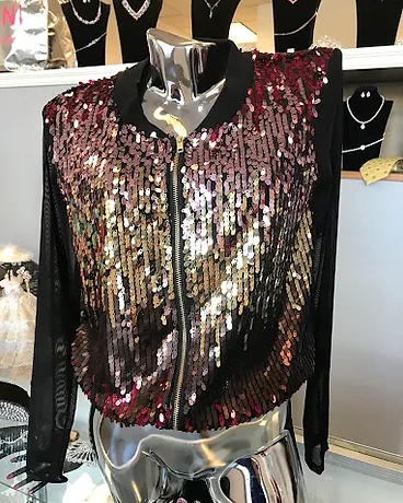 Sequined gradient bomber jacket on chrome mannequin