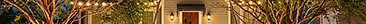 Residential Christmas lighting with illuminated walkway in New Orleans