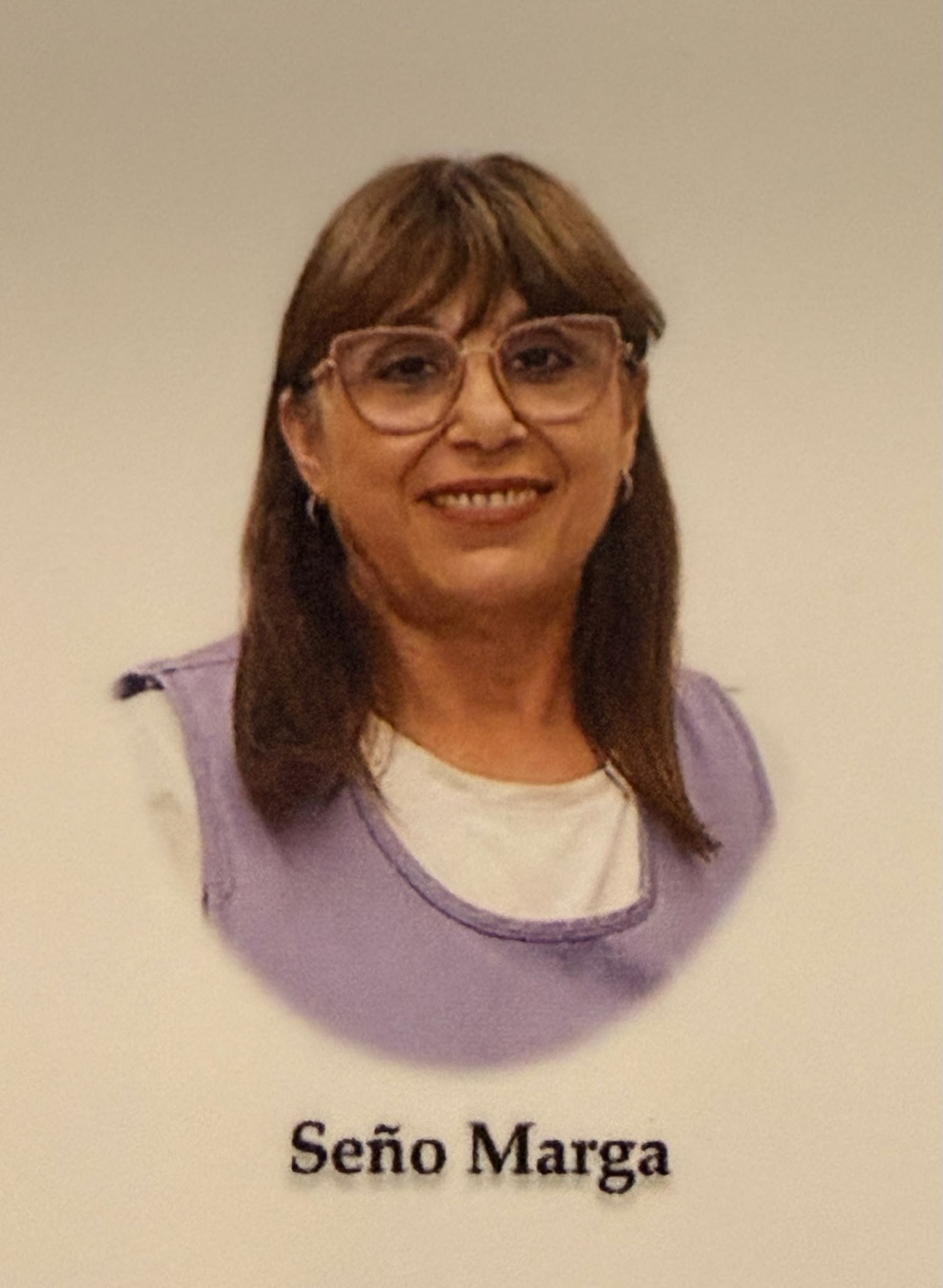 Retrato de Seño Marga, educadora de Arco Iris