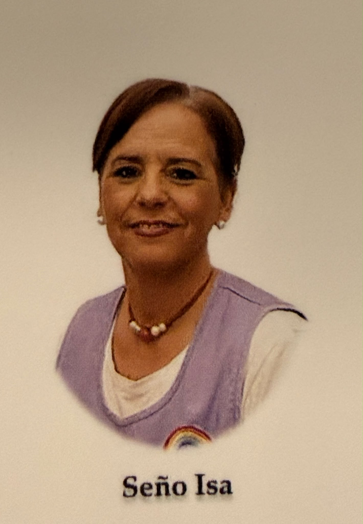 Retrato de Seño Isa, educadora de Arco Iris