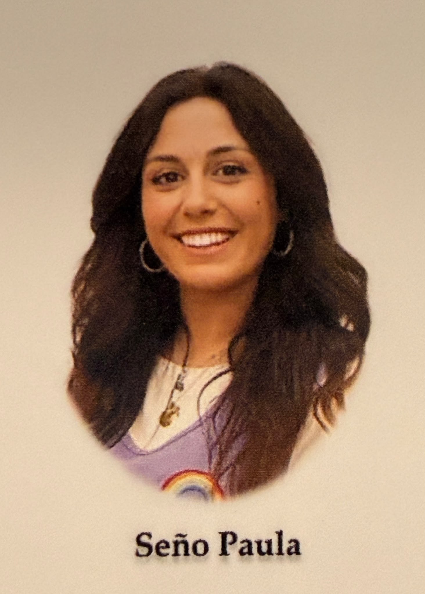 Retrato de Seño Paula, educadora de Arco Iris