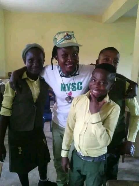 NYSC corps member with Epiphany Secondary School students
